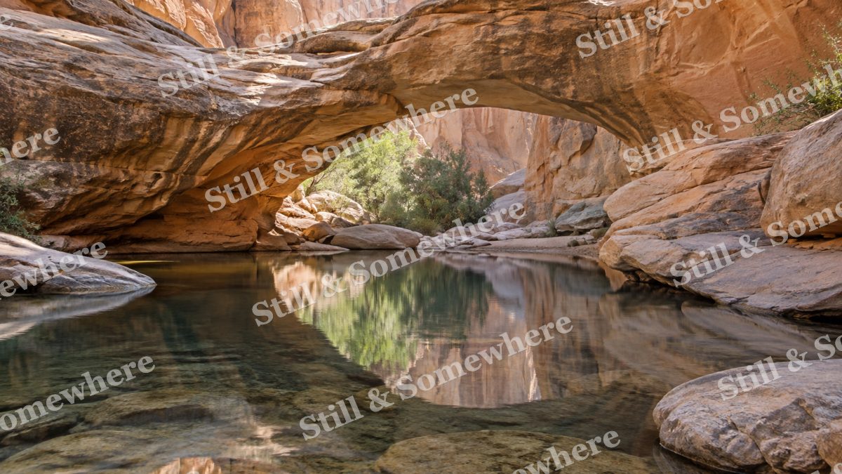 Landscapes Still Water Beneath a Carved Sandstone Arch, peaceful landscapes artwork preview